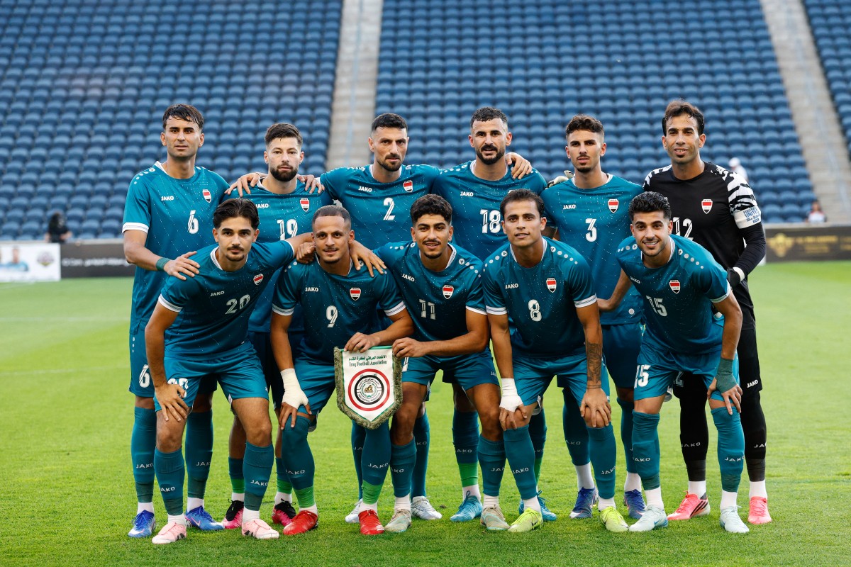 لاعبو العراق. (أ ف ب)