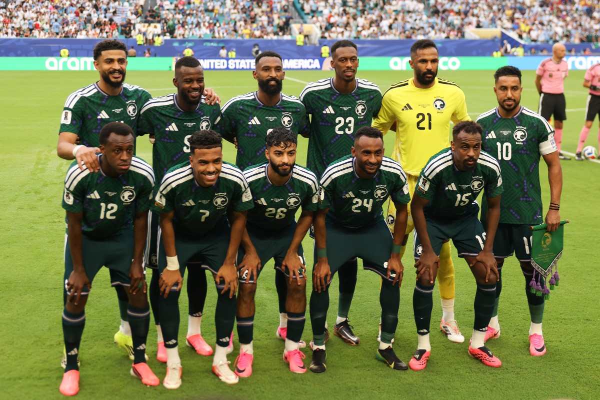 لاعبو السعودية. (أ ف ب)