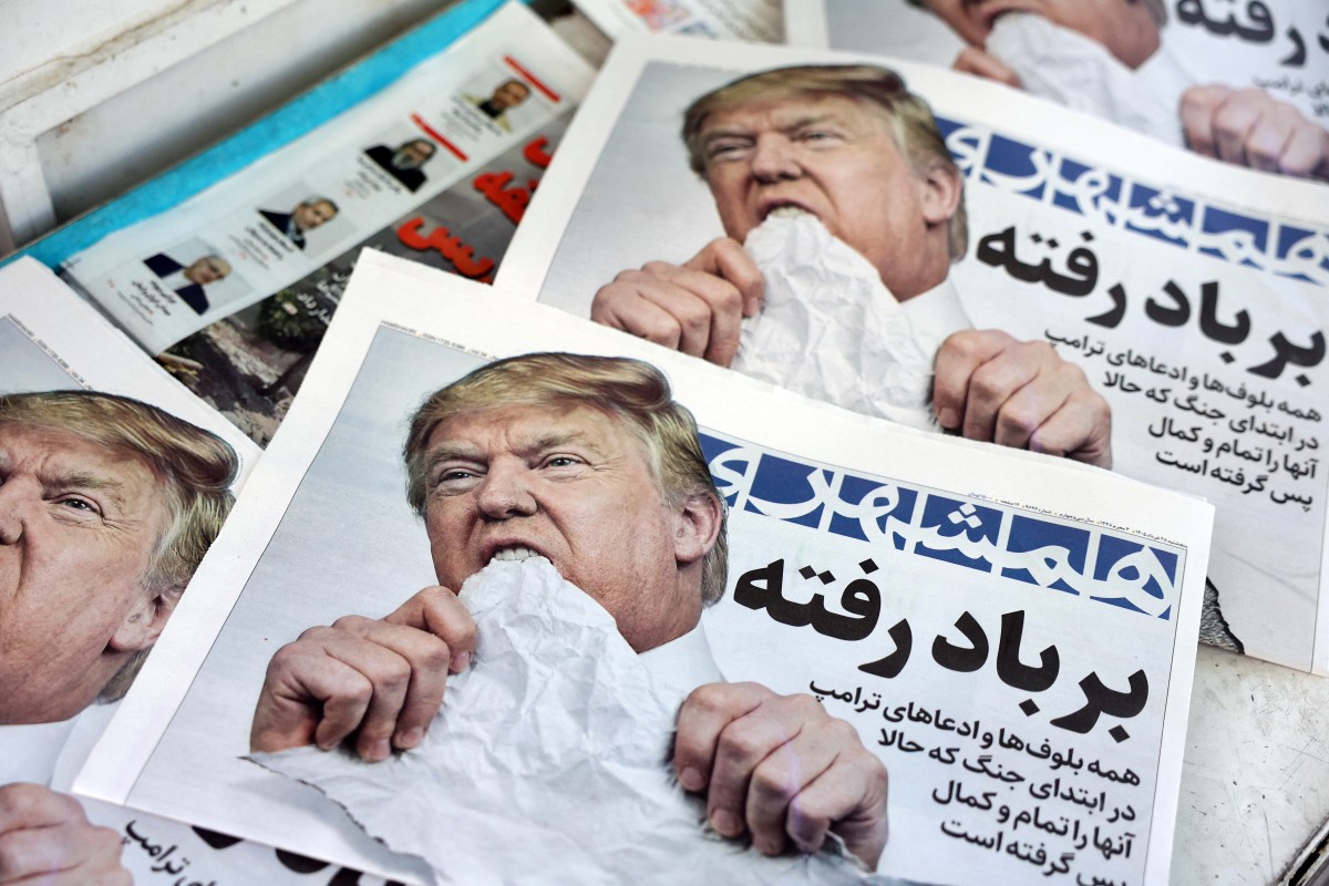 الصحف الإيرانية تهزأ من ترامب عقب توقيع مذكرة التفاهم (أ ف ب).