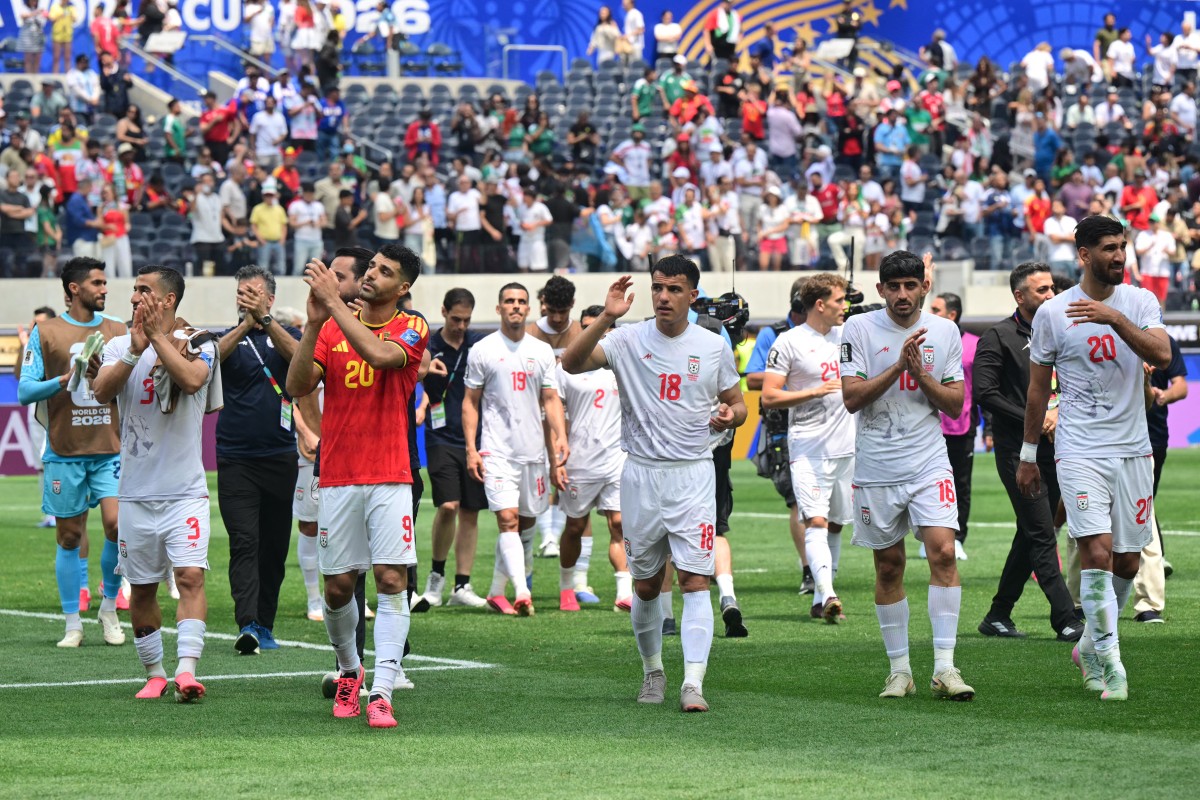 لاعبو إيران. (أ ف ب)