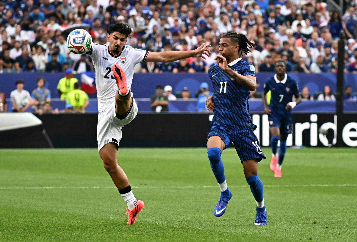 مباراة العراق وفرنسا في كأس العالم. (أ ف ب)