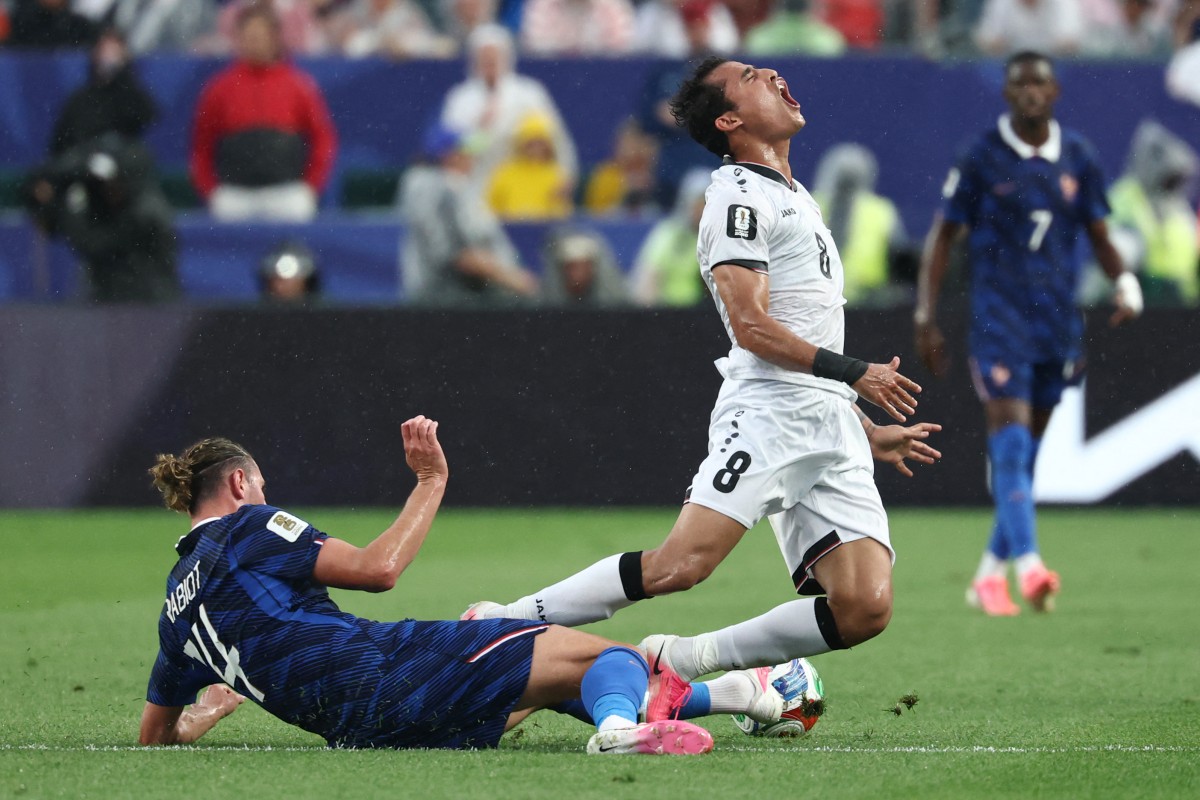 مباراة العراق وفرنسا في كأس العالم. (أ ف ب)
