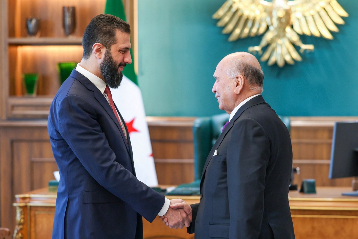 الرئيس السوري أحمد الشرع يستقبل وزير الخارجية العراقي فؤاد حسين في دمشق، 29 حزيران/يونيو 2026. (أ ف ب)