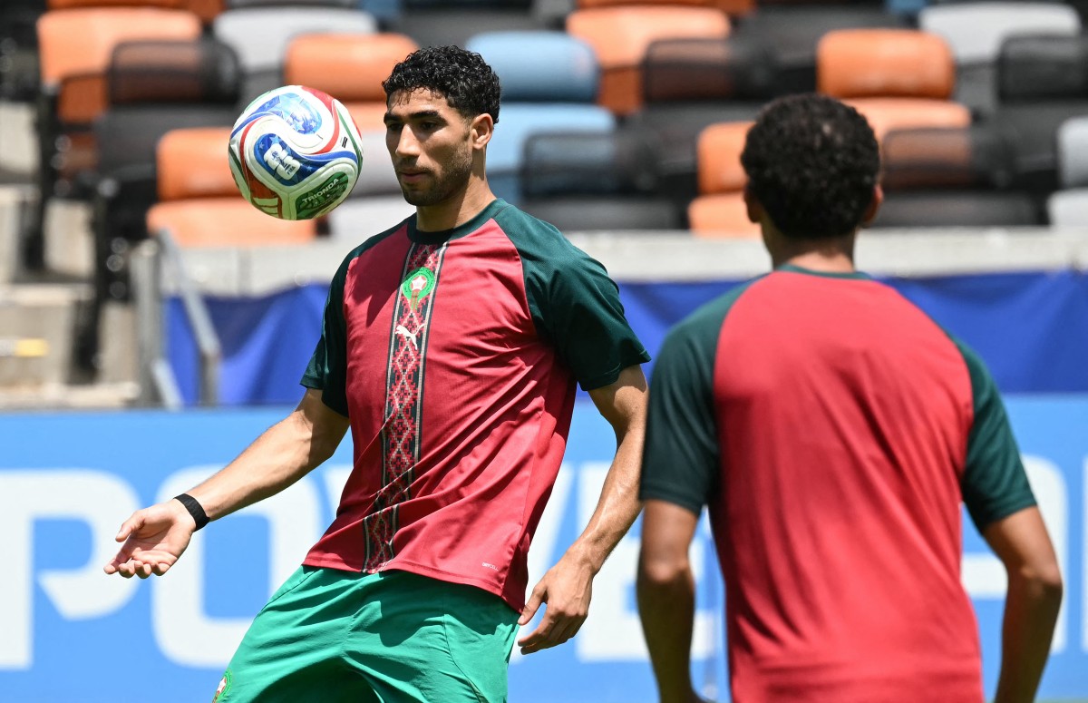 من تدريبات المغرب استعداداً لمباراة كندا. (أ ف ب)