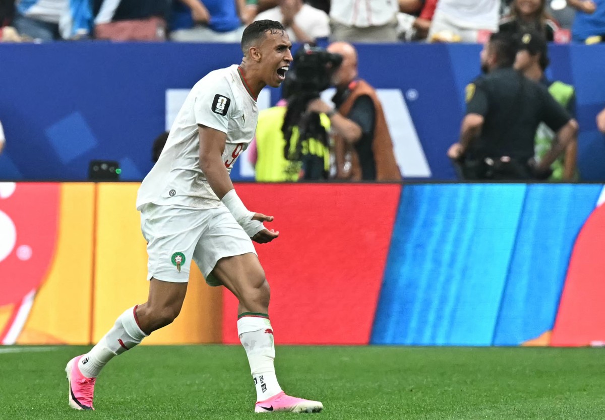 فرحة لاعب المغرب سفيان رحيمي. (أ ف ب)