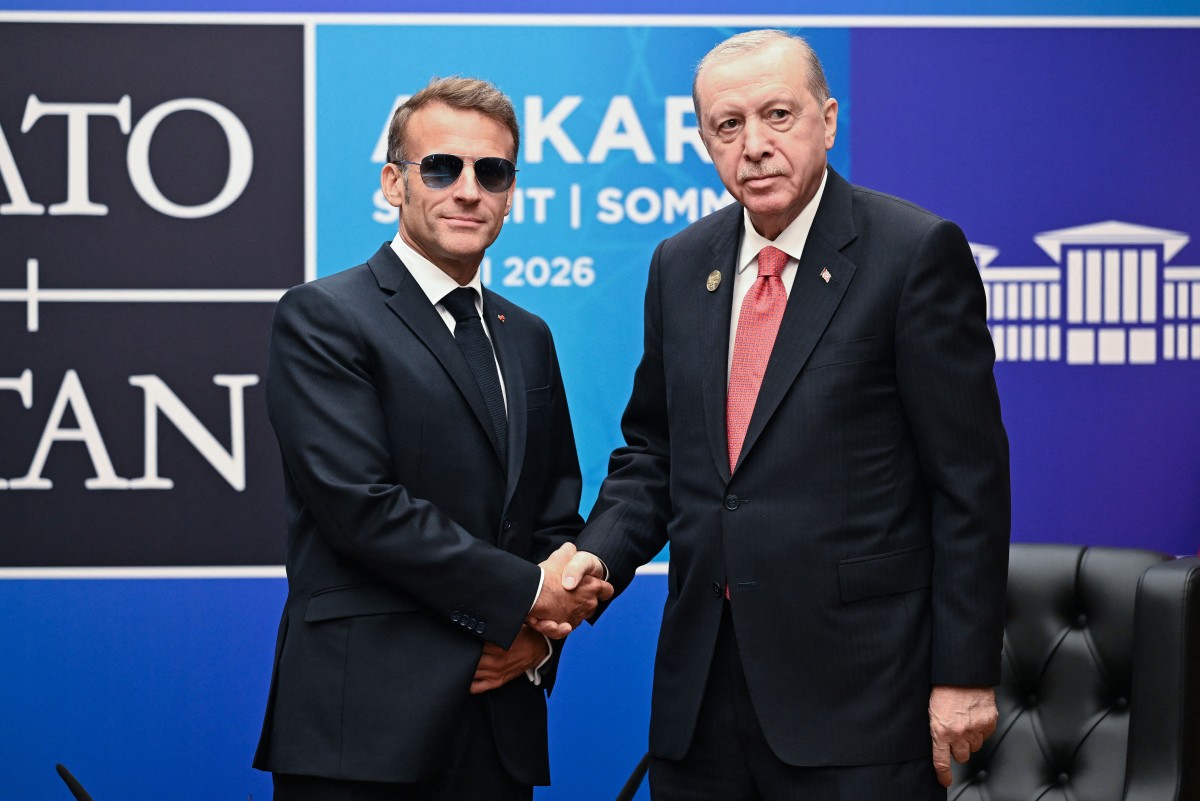 أردوغان وماكرون. (أ ف ب)