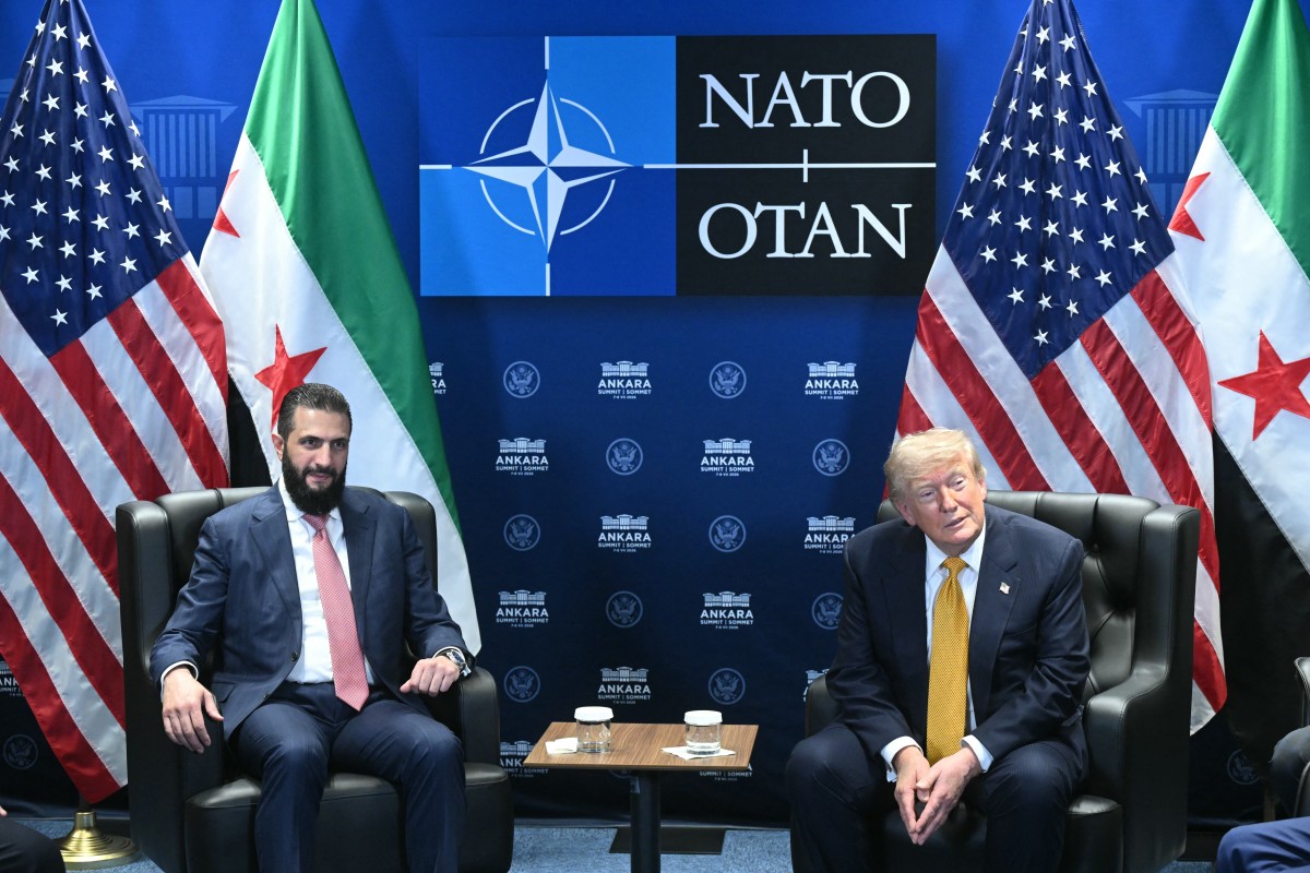 دونالد ترامب وأحمد الشرع. (أ ف ب)