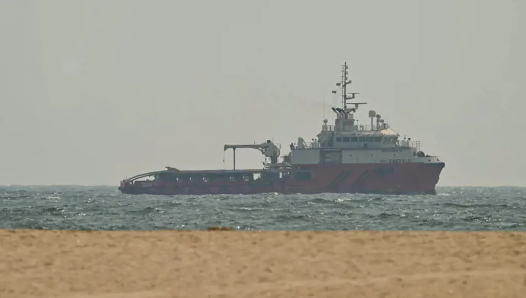 A ship sails off the coast of Oman on July 10, 2026 (AFP).