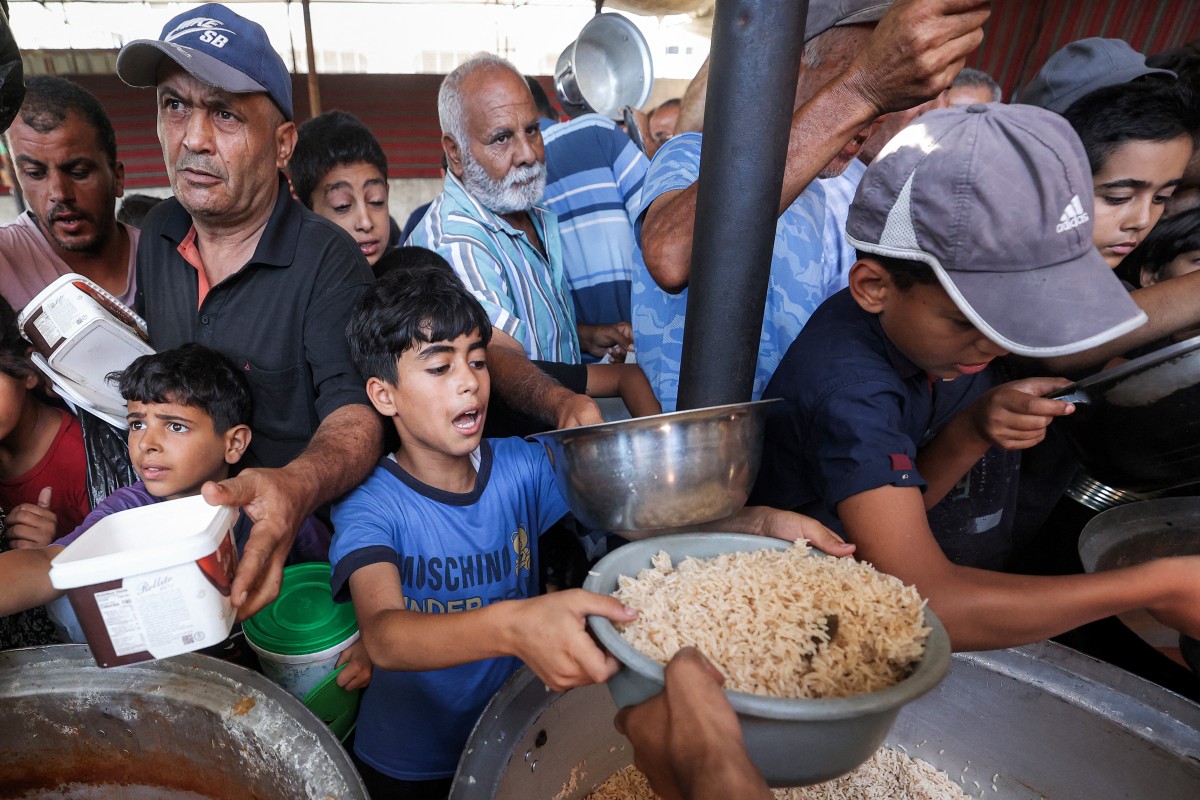 فلسطينيون في غزة. (أ ف ب)