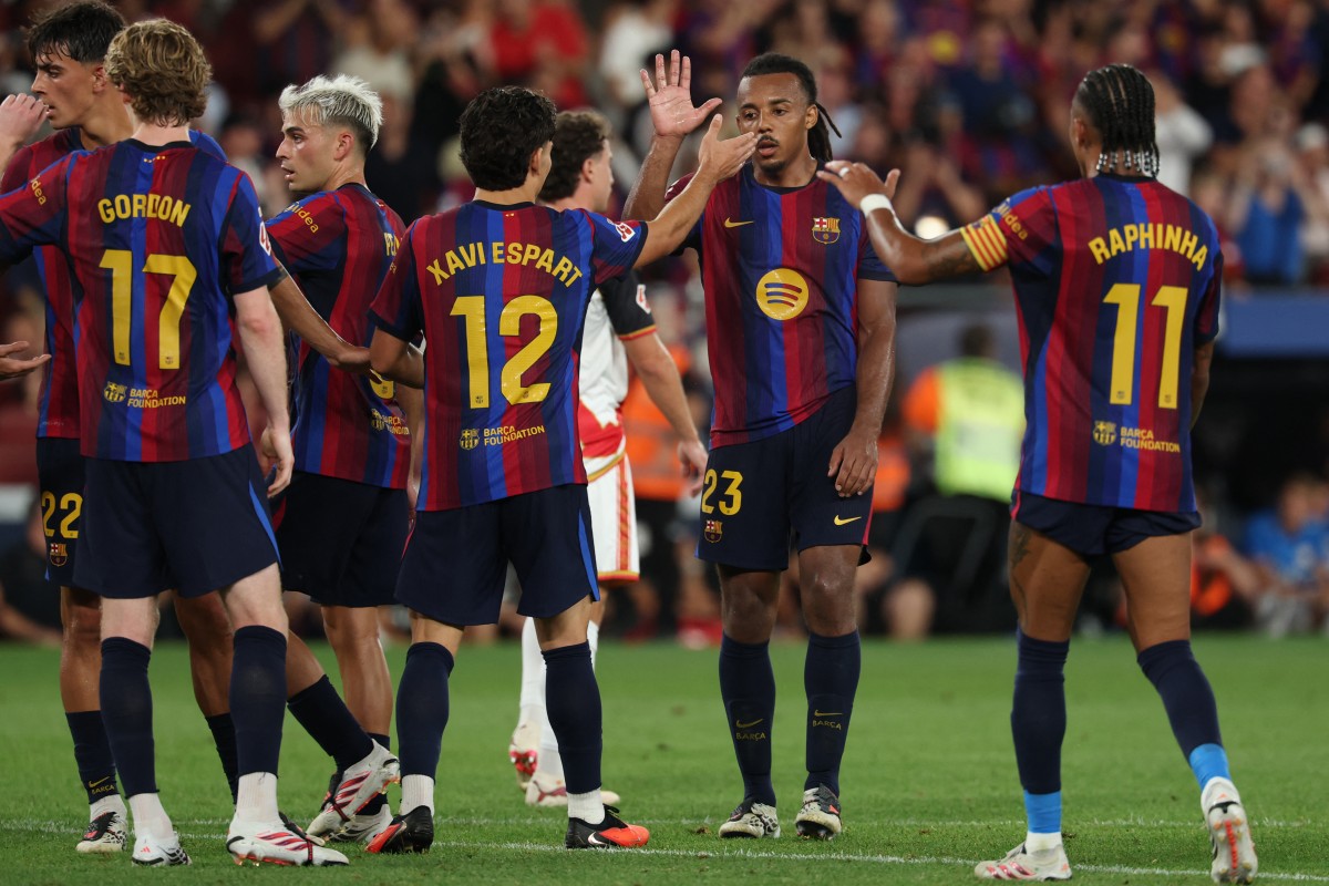 من مباراة برشلونة ورايو فاييكانو. (أ ف ب)
