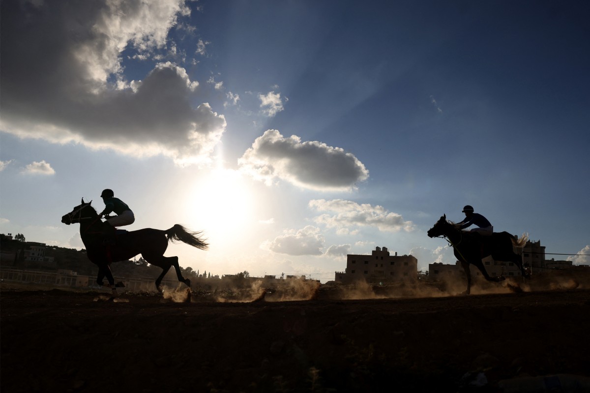 سباق الخيل يعود إلى قرية المجد الفلسطينية. (أ ف ب)