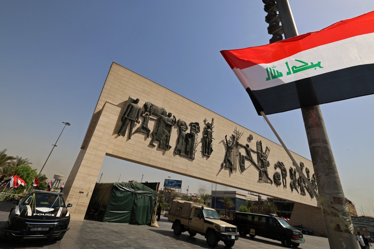 العلم العراقي في بغداد (أ ف ب).