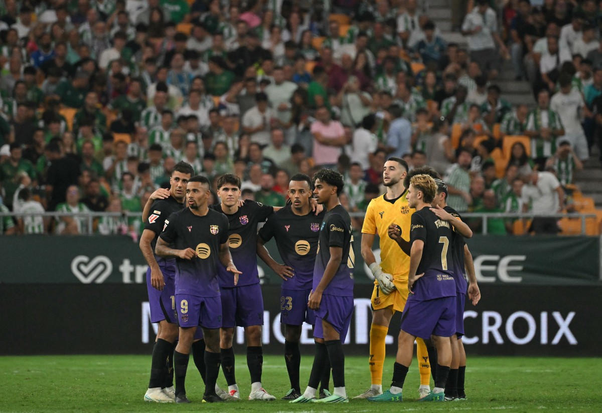 من مباراة برشلونة وريال بيتيس في الدوري الإسباني. (أ ف ب)