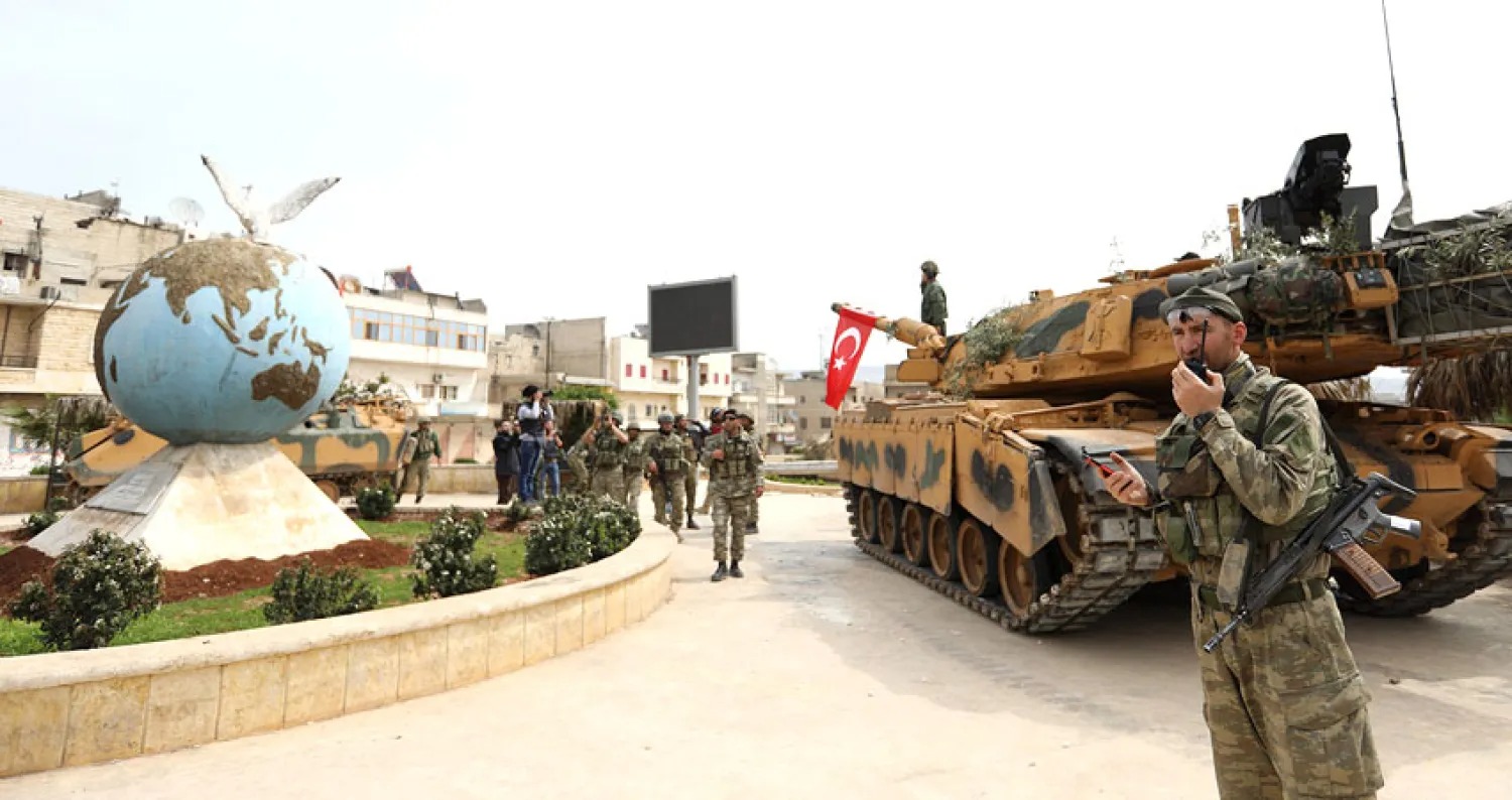 عناصر تركية بوسط عفرين في مارس 2018 (أ.ف.ب)