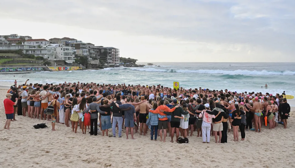 Millions are pledged to a Syrian Australian man who stopped a gunman and became a national hero