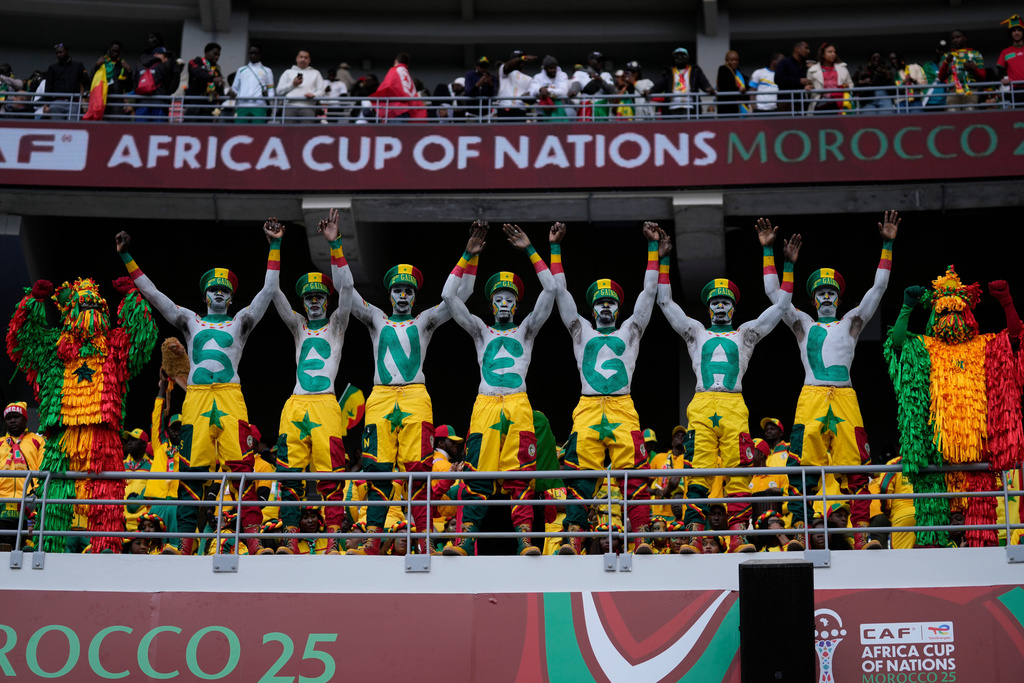 Senegal fans support their national team during the Africa Cup of Nations group D soccer match between Senegal and DR Congo in Tangier, Morocco, Saturday, Dec. 27, 2025. (AP Photo/Themba Hadebe)