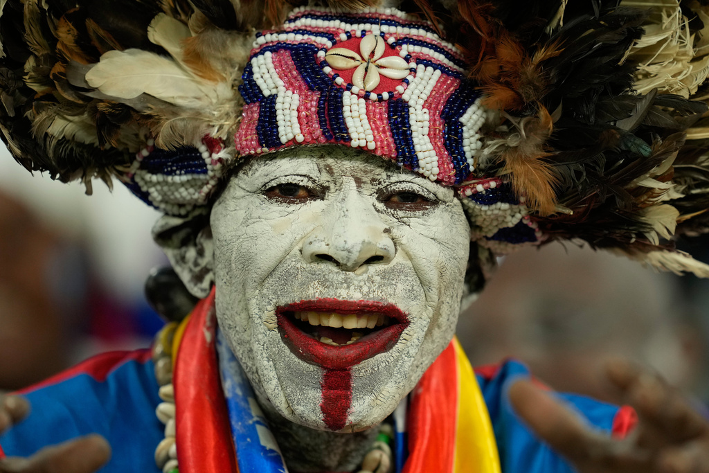 A DR Congo fan cheers prior to the Africa Cup of Nations group D soccer match between Botswana and DR Congo in Rabat, Morocco, Tuesday, Dec. 30, 2025. (AP Photo/Mosa'ab Elshamy)