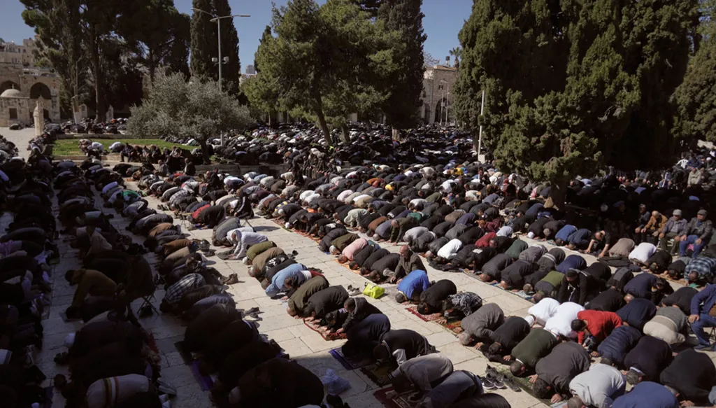 Ramadan's first Friday prayers are held at Jerusalem's Al-Aqsa Mosque (AP)