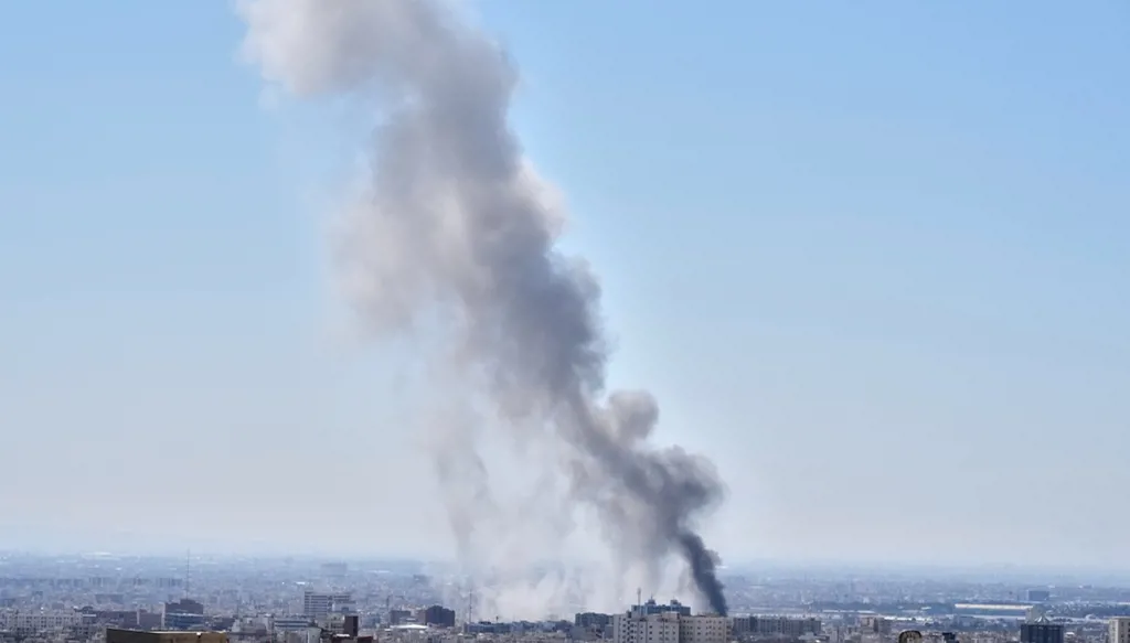 Photos from inside Iran as strikes boom across the capital, Tehran, for a third day