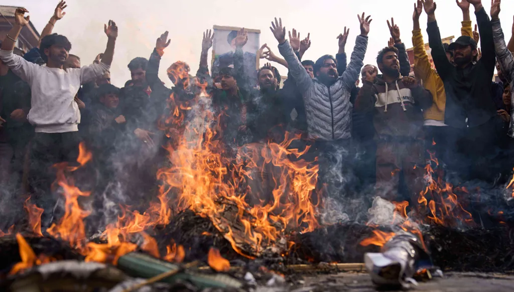 Iran's president defies US demands while apologizing for strikes on neighbors (AP)