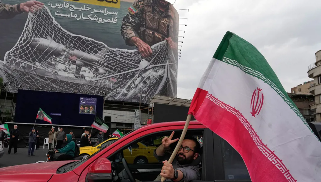 Efforts underway for second round of US-Iran talks as ships reported transiting Strait of Hormuz (AP)