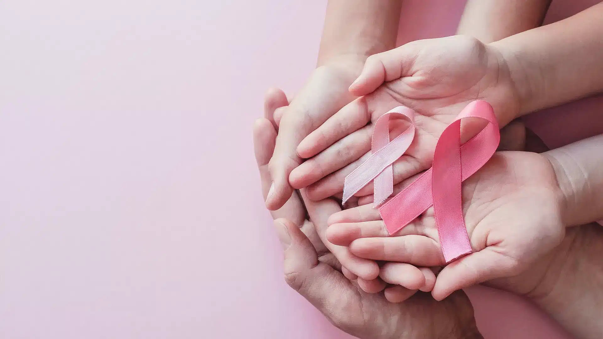 BreastCancerRibbonHeldinHands_140451.web