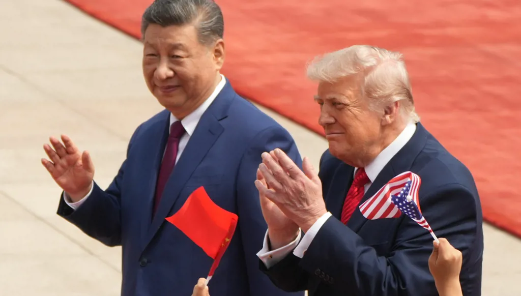 Xi and Trump summit focuses on business links as Chinese leader issues Taiwan warning