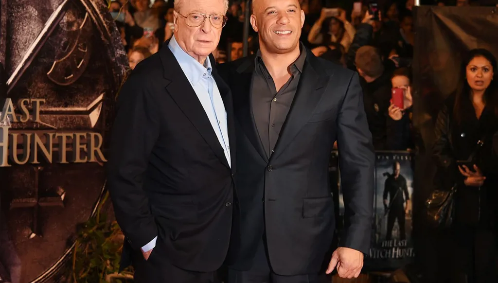 فين ديزل يدفع مايكل كاين على كرسي متحرك في لندن (صور)