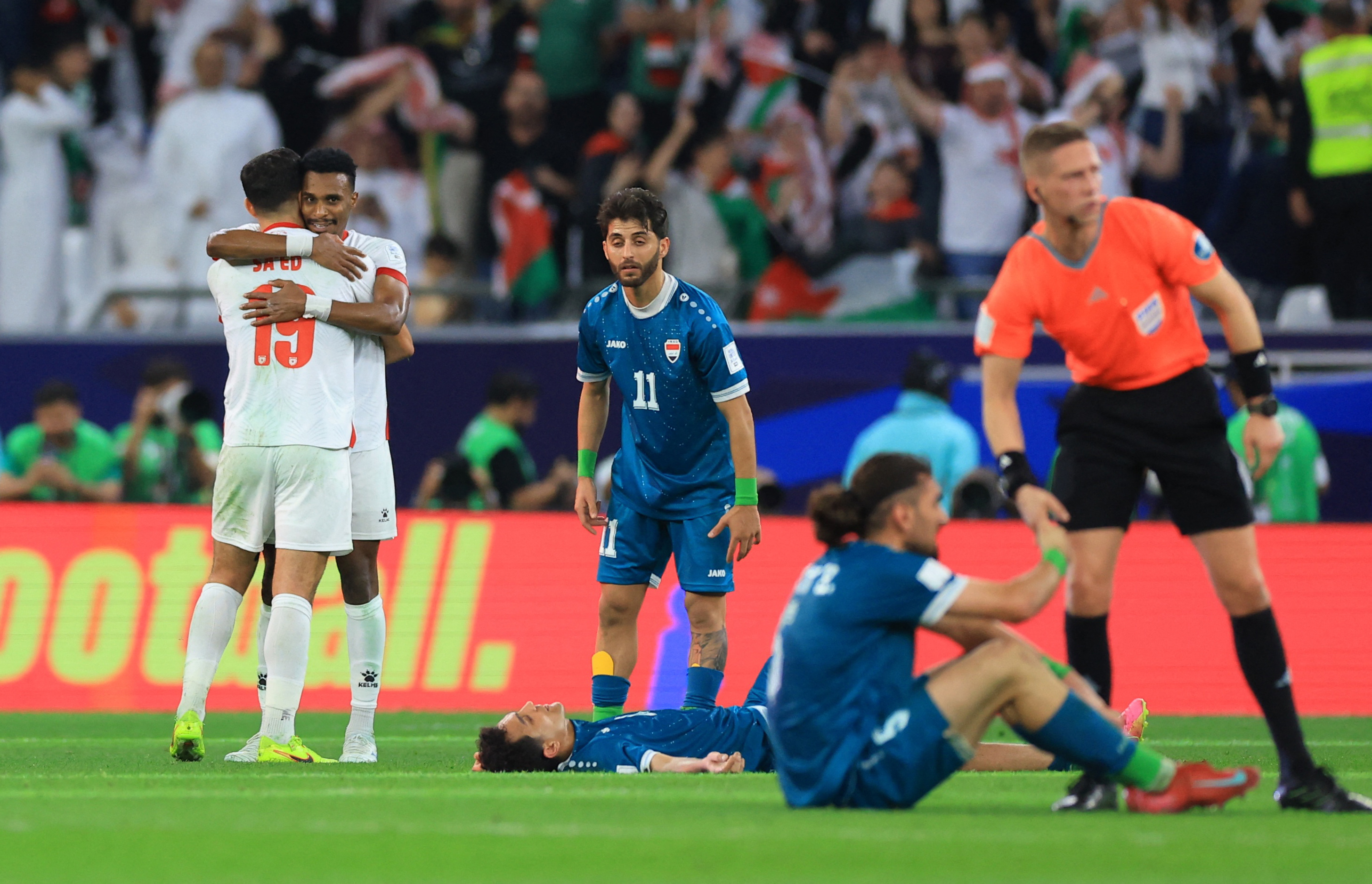 من مباراة العراق والأردن في كأس العرب. (وكالات)