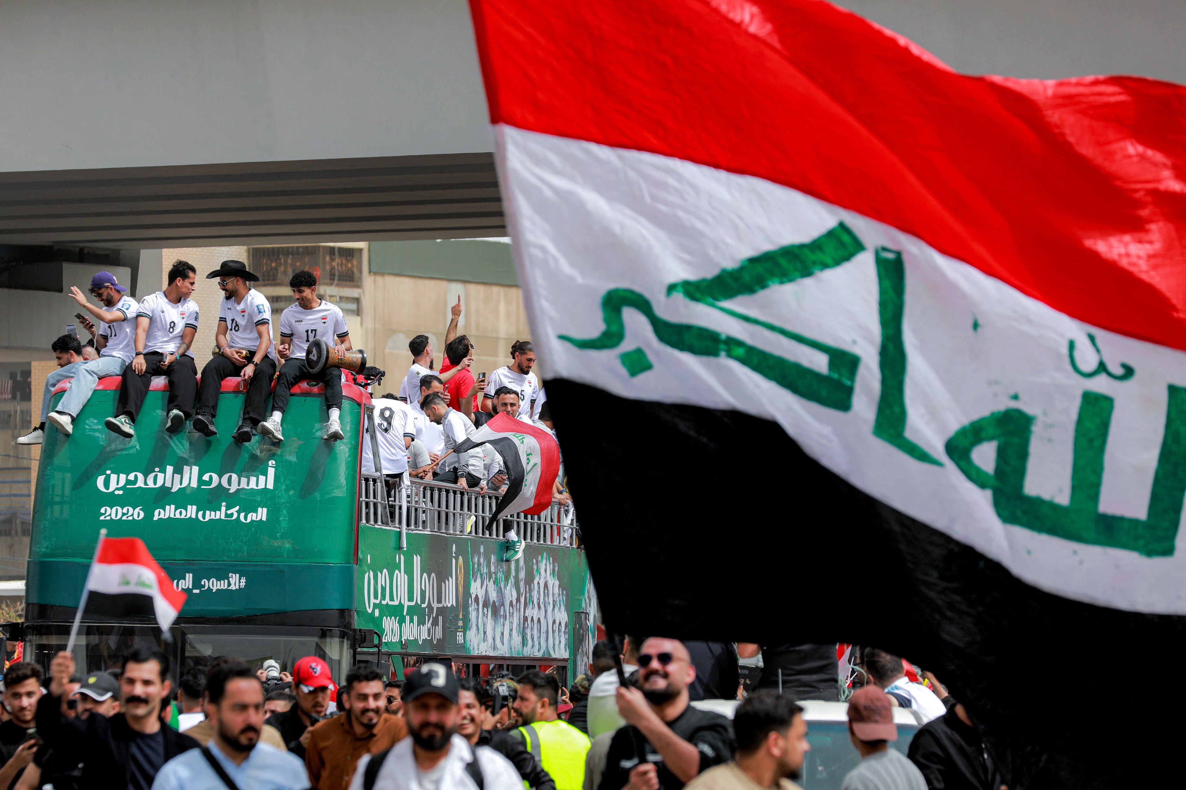 من احتفالات منتخب العراق بالتأهل إلى كأس العالم. (وكالات)