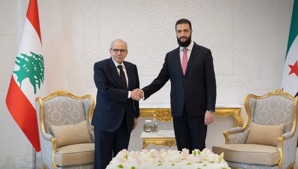 نواف سلام ملتقياً أحمد الشرع. (سانا)