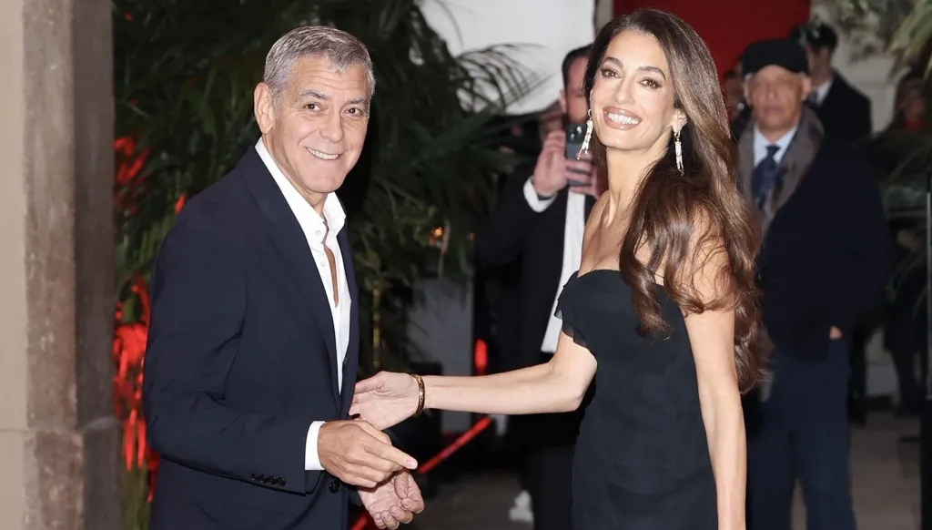 إطلالة أمل وجورج كلوني في ميلانو تشعل حديث الموضة مع انطلاق أولمبياد 2026