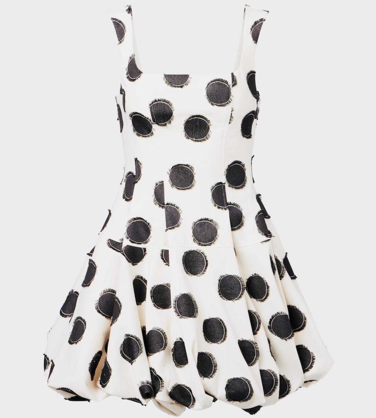 فستان بولكا دوت بقصّة بالون من Simkhai (موقع العلامة) 