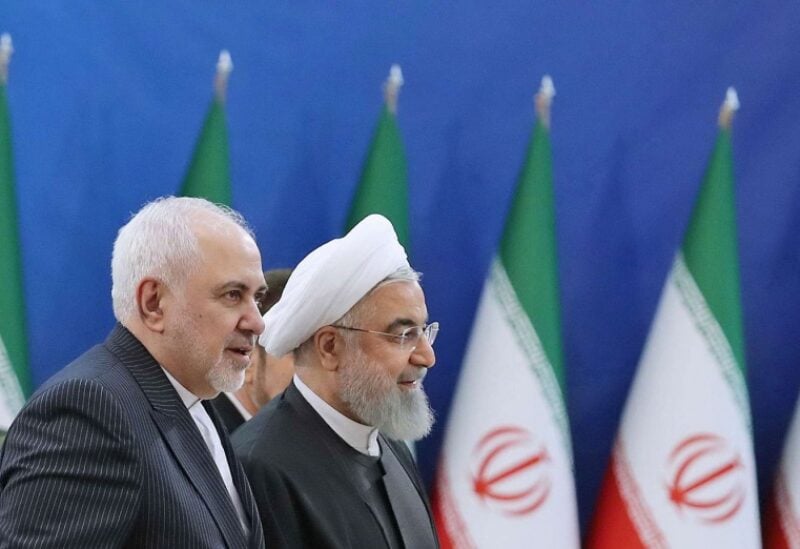 روحاني وظريف. (وكالات)