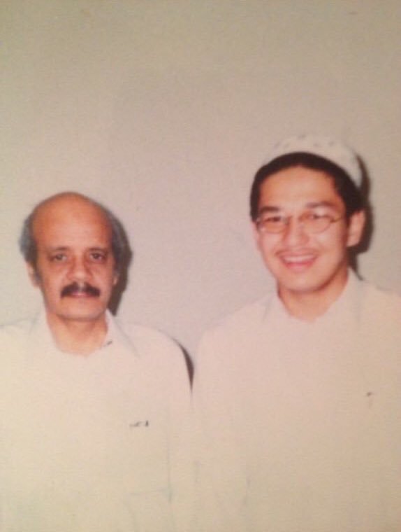 Saudi journalist and writer Ahmed Adnan in a photo with the late Talal Maddah in 1998.