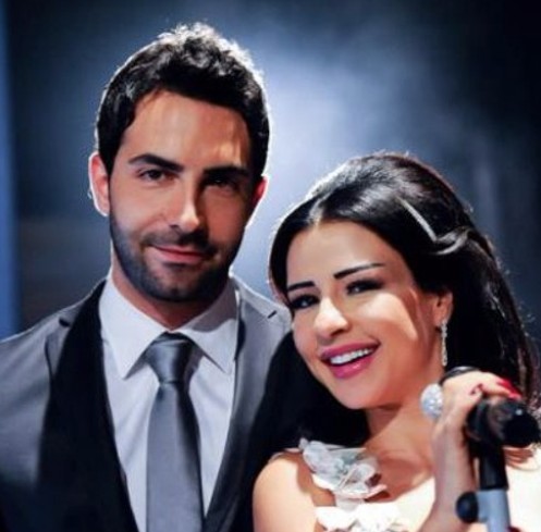 صورة قديمة تجمع ماغي بو غصن وكارلوس عازار (مواقع التواصل الإجتماعي)