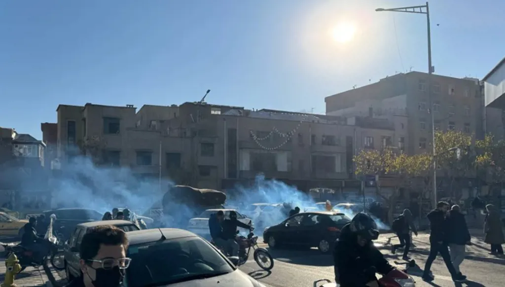 Iranian Basij member killed as protests over rising living costs spread