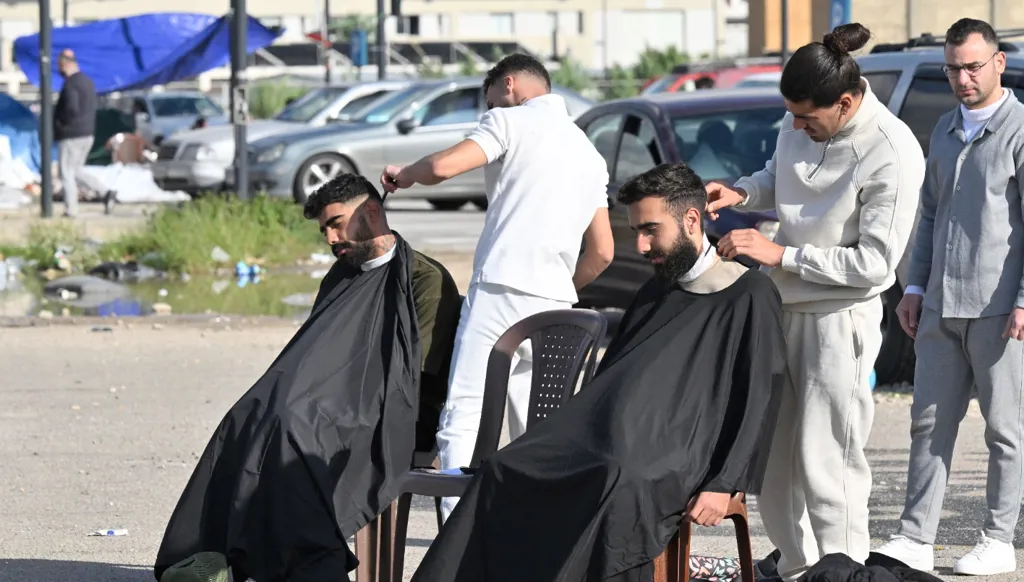 Street barbering during displacement times.