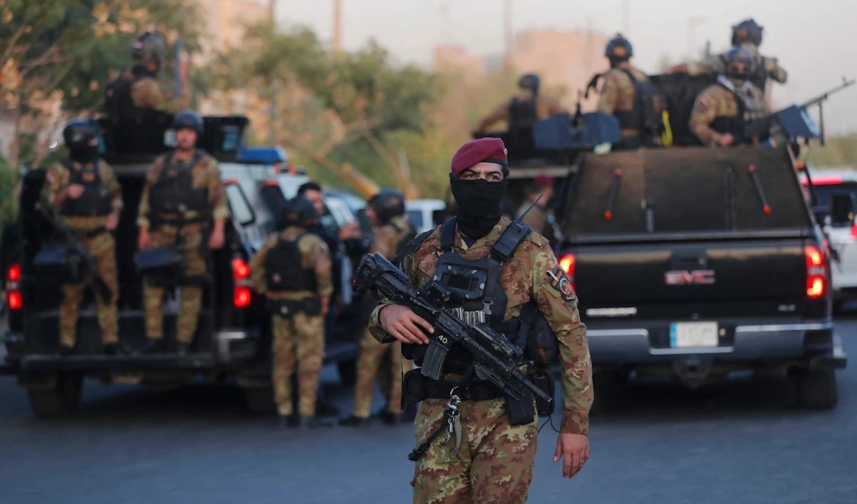 عناصر من الحشد الشعبي في بغداد. (أ ف ب)