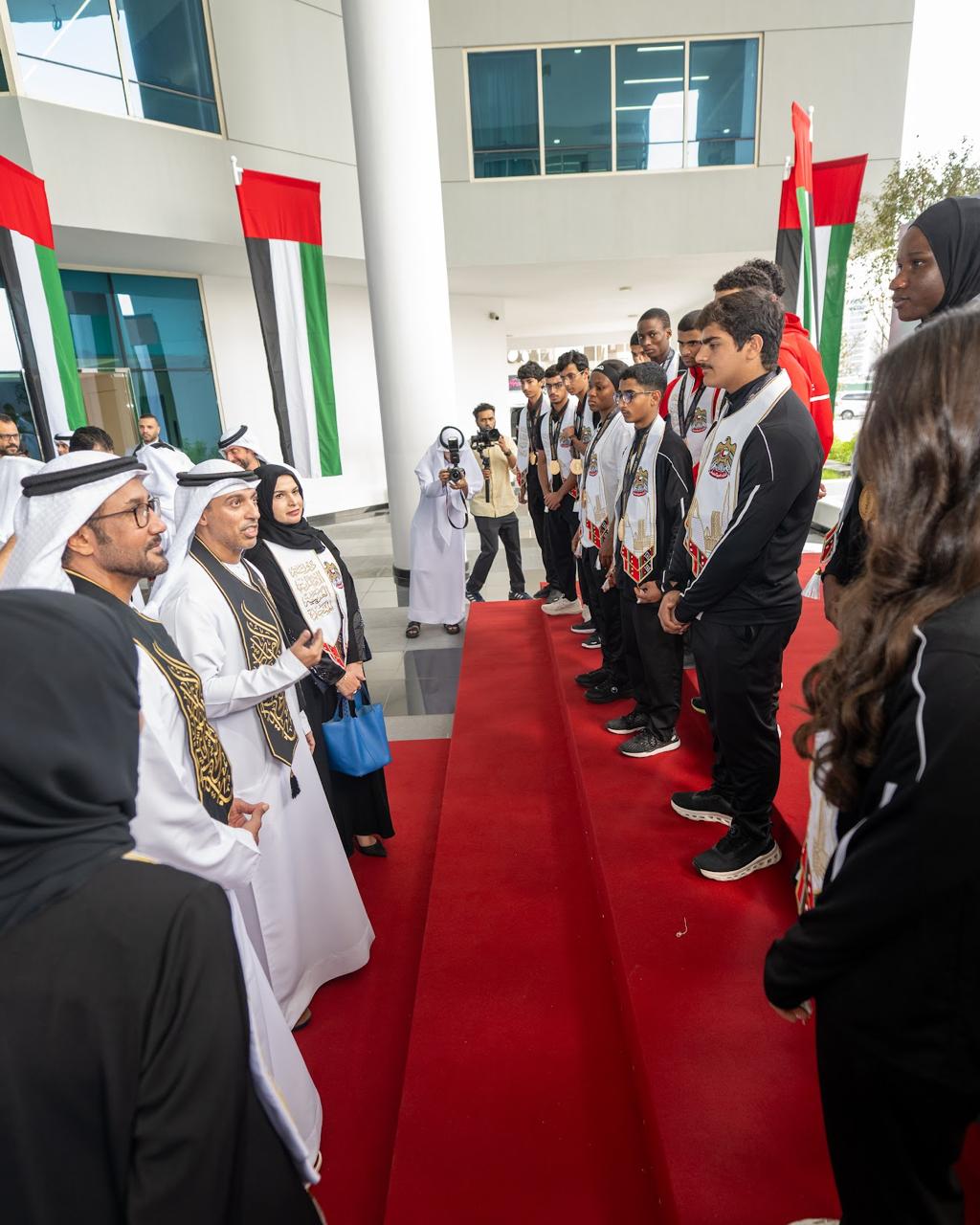 خلال الاحتفال بفعالية يوم العلم في مقر اللجنة الأولمبية الإماراتية في دبي. (وكالات)