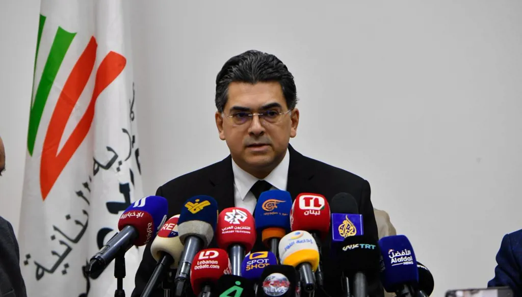 وزير الإعلام المحامي د. بول مرقص (حسام شبارو)