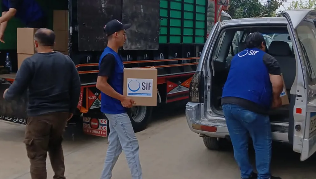 من توزيع المساعدات الاغاثية في عكار. (النهار)