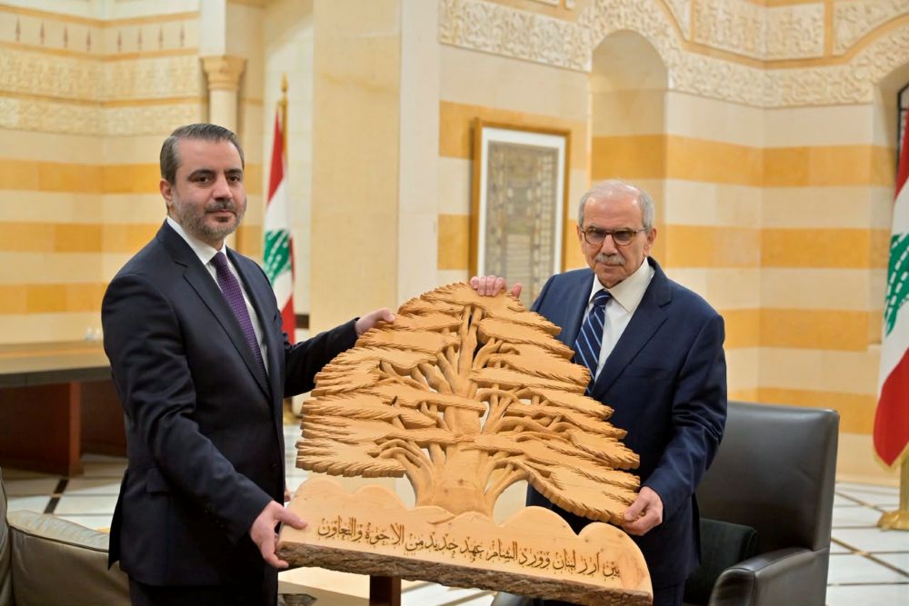 President Salam and Minister Asaad Al Shibani.