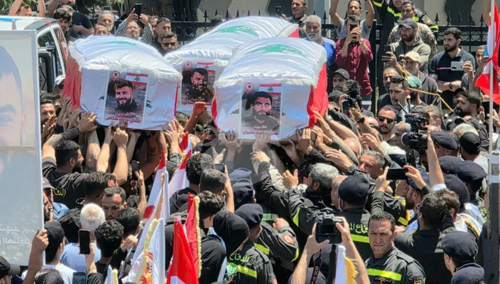 Funeral of Civil Defense members, victims of the Israeli airstrike in Majdalzoun. (Ahmed Montash)