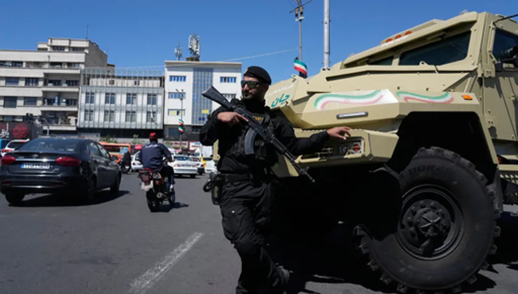 A member of Iran's police special forces stands guard in Tehran, Iran, Friday, April 24, 2026. (AP Photo/Vahid Salemi)