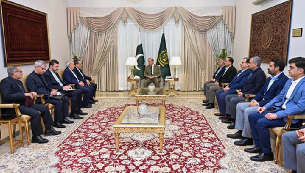 In this photo released by the Pakistan Prime Minister Office, Iran's Foreign Minister Abbas Araghchi, fifth left, meets with Prime Minister Shehbaz Sharif, center, in Islamabad, Pakistan, Saturday, April 25, 2026. (Pakistan Prime Minister Office via AP)