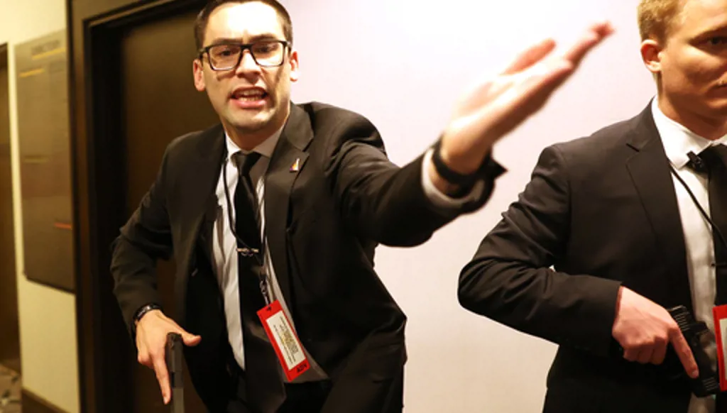 Secret service agents respond during the White House Correspondents Dinner, Saturday, April 25, 2026, in Washington. (AP Photo/Tom Brenner)