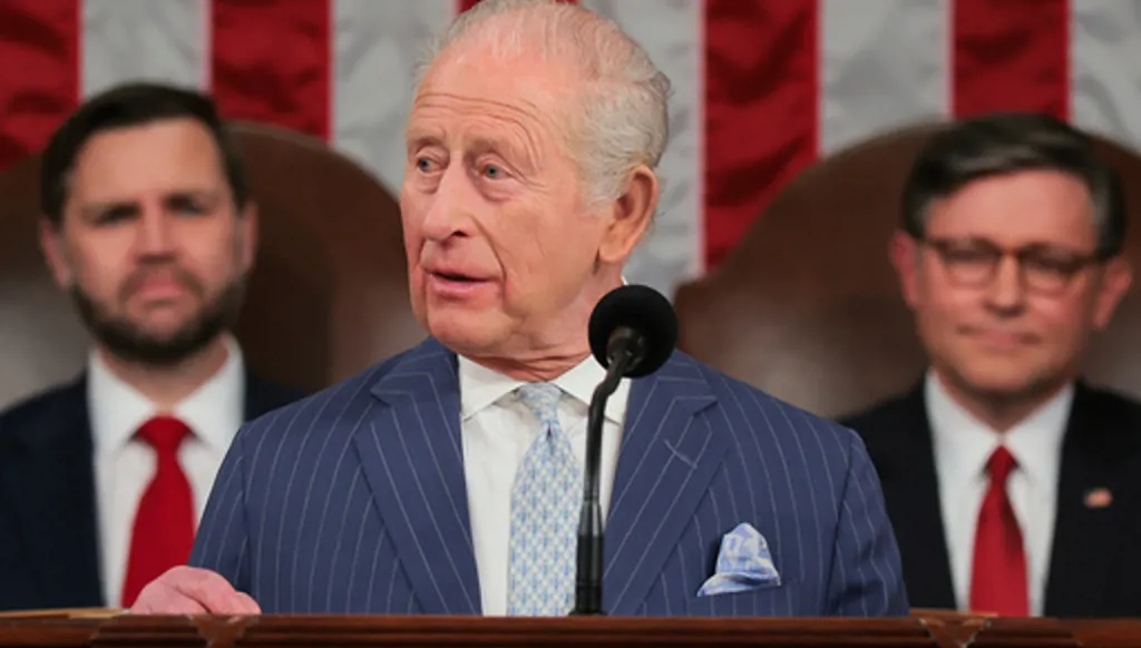 Britain's King Charles III addresses a joint meeting of Congress while Vice President JD Vance, left, and House Speaker Mike Johnson, R-La., right, listen in the House Chamber of the U.S. Capitol in Washington, Tuesday, April 28, 2026. (Kylie Cooper/Pool via AP)