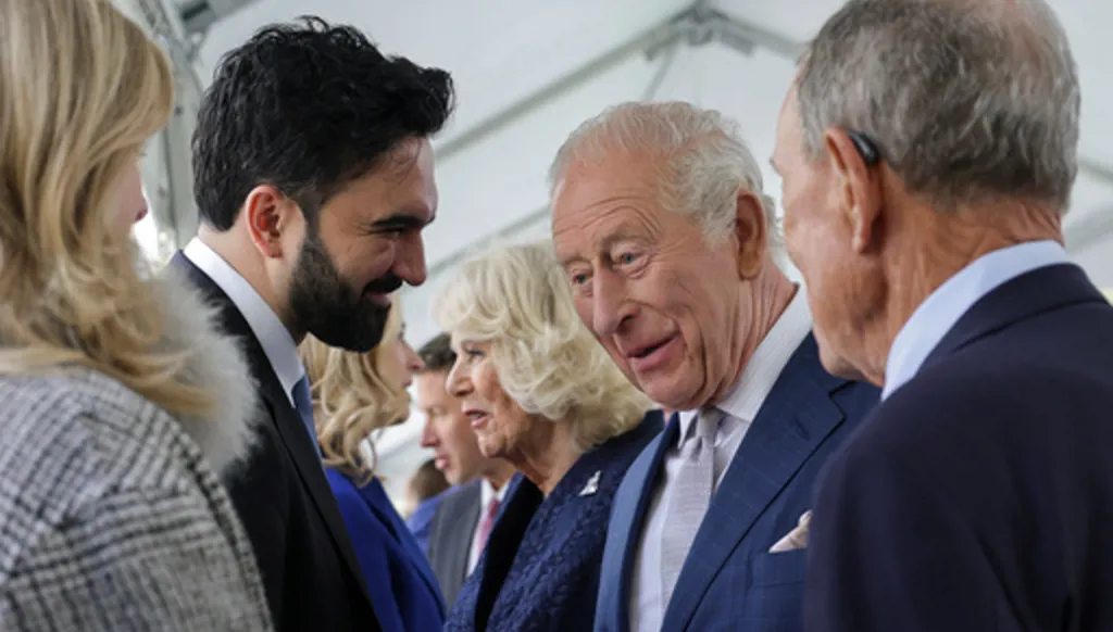 Britain's King Charles III standing next to Queen Camilla interacts with New York City Mayor Zohran Mamdani during a visit to the 9/11 Memorial, in New York, Wednesday, April 29, 2026. (Jeenah Moon/Pool Photo via AP)