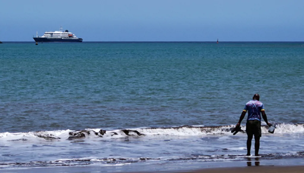 The MV Hondius cruise ship is anchored at a port in Praia, Cape Verde, Monday, May 4, 2026. (AP Photo/Arilson Almeida)